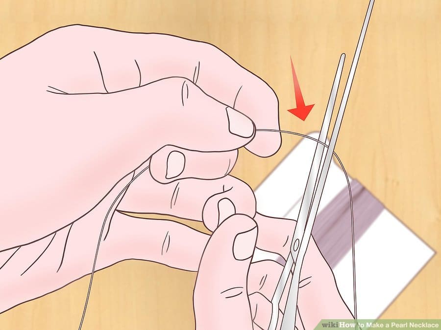 Mesurez et utilisez des ciseaux pour couper votre ligne de soie